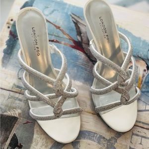 So pretty white wedges with tiny rhinestones. Super comfy with 3 1/4” heels.